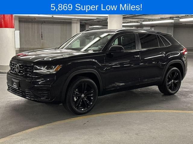 a black suv is parked in a parking garage with the words 5, 899 super low miles