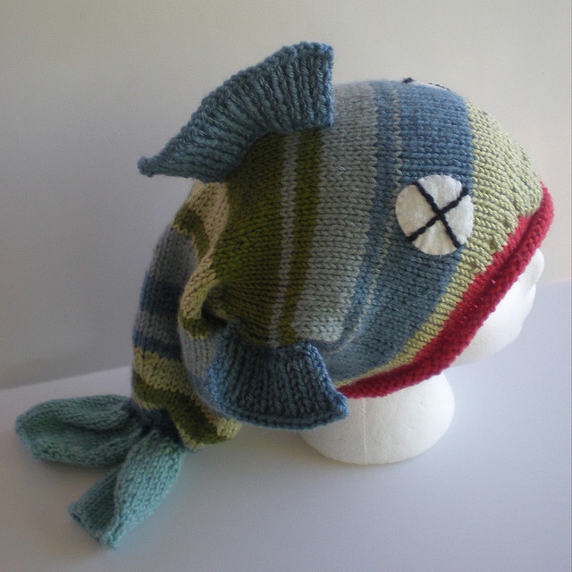 a knitted hat with a fish on it