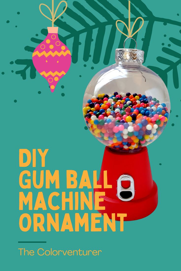 a gum ball machine ornament on a green background