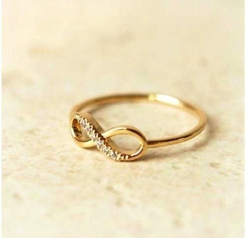 an image of a gold ring with diamonds on the bottom and in the middle that says best seller holiday sale