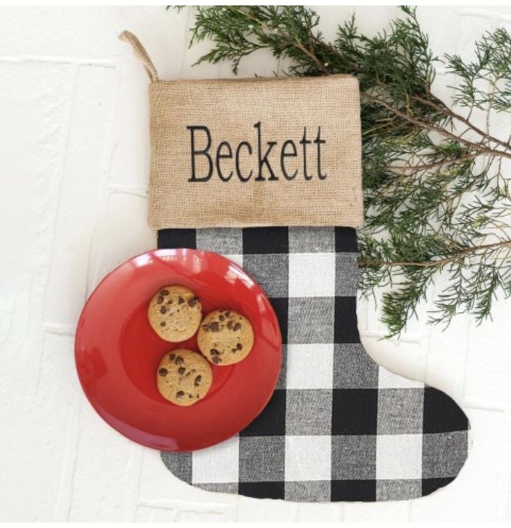 a red plate with cookies on it next to a burlock that says beckett