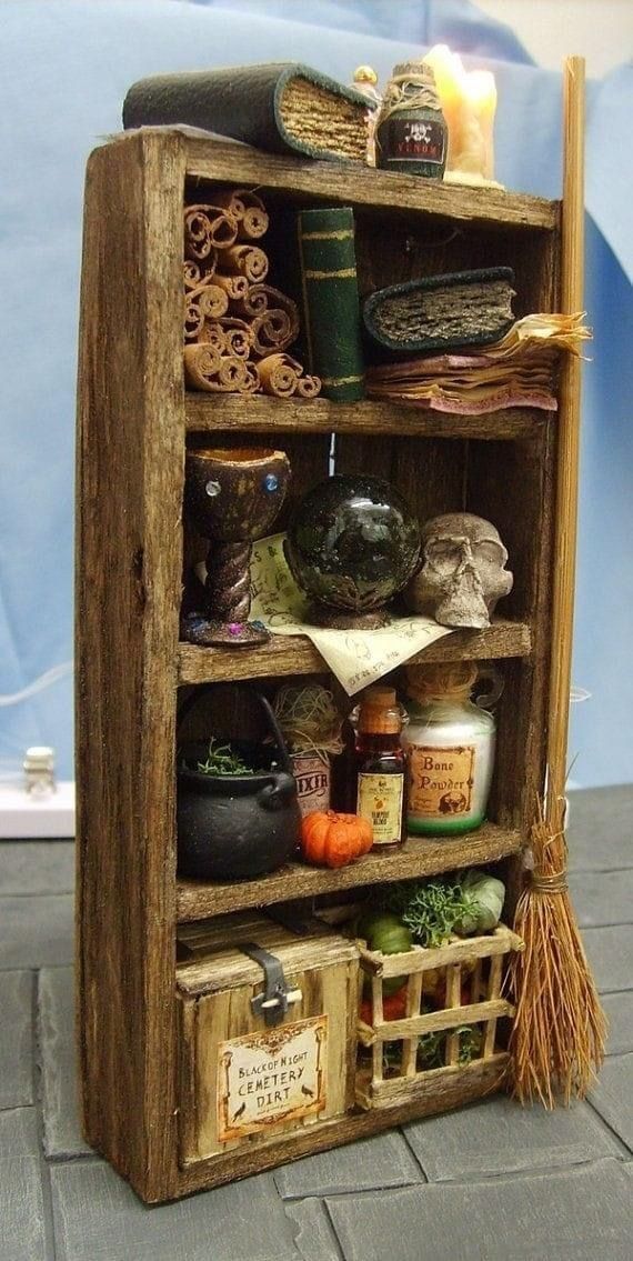 a wooden shelf filled with lots of different items