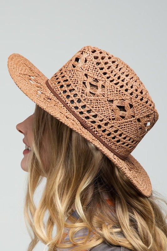 NON-ELIGIBLE FOR RETURN. FINAL SALE The Handweaving Open-Weave Panama Hat offers a balance between shade and style. It's the perfect hat for beaches, resorts, and tropical getaways. Crafted with 100% paper, this hat features an elaborate handweaving open-weave pattern that is both stylish and functional, allowing for plenty of breathability to keep you cool and comfortable in the heat. Sun Hat Vegan leather band 100% Paper Inner-adjustable band Circumference: 23.75" Brim: 3.25" Crown height: 5.5 Beaches Resorts, Straw Sun Hat, Tropical Getaways, Open Weave, Hat Band, Leather Band, Tan Brown, Daily Fashion, Sun Hats