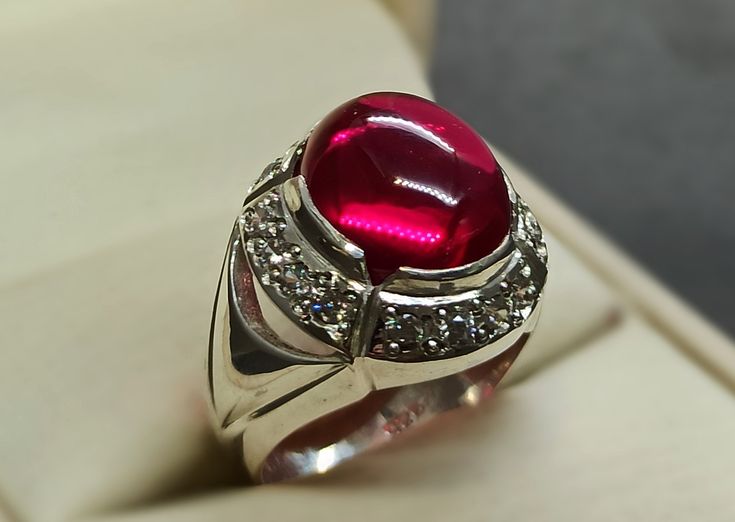 Cabochon Pigeon Dark Deep Red Ruby Sterling Silver 925 Handmade Women Ring Product: Ring Gemstone: Ruby Color: Red Handmade Ring It is heated and treated (lab created) but High Quality Ruby with pure 925 Sterling Silver Handmade Ring. Ruby Cabochon Round Jewelry, Classic Red Jewelry As A Gift, Classic Red Gemstone Jewelry, Classic Polished Gemstones As A Gift, Classic Polished Gemstones For Gifts, Classic Polished Gemstones For Gift, White Gold Round Ruby Gemstones, Luxury Red Jewelry For Gift, Anniversary Cabochon Gemstones