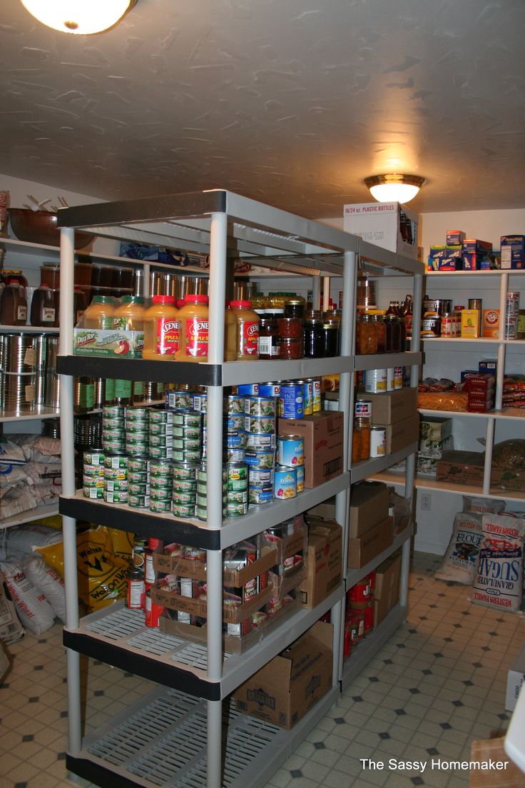 the shelves are full of food and drinks in the store's storage area,