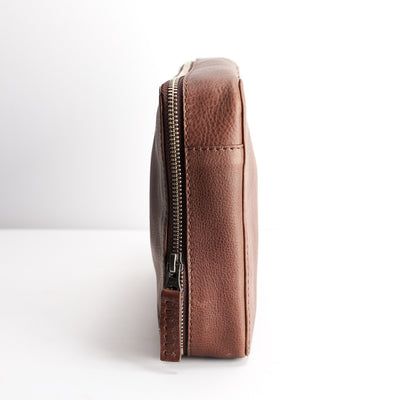 Small Gear Travel Pouch · Brown by Capra Leather Functional Pouch With Luggage Sleeve For Everyday Use, Functional Everyday Pouch With Luggage Sleeve, Functional Everyday Use Pouch With Luggage Sleeve, Brown Travel Pouch Pencil Case, Travel Brown Pouch Pencil Case, Brown Pouch Pencil Case For Travel, Leather Zipper Pouch Case For Everyday Use, Everyday Leather Zipper Pouch Case, Leather Cases With Pen Slots For Daily Use