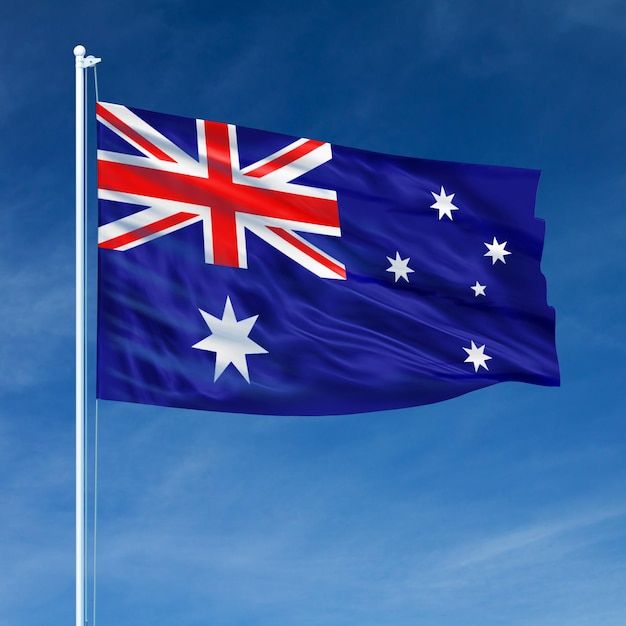 an australian flag flying in the blue sky