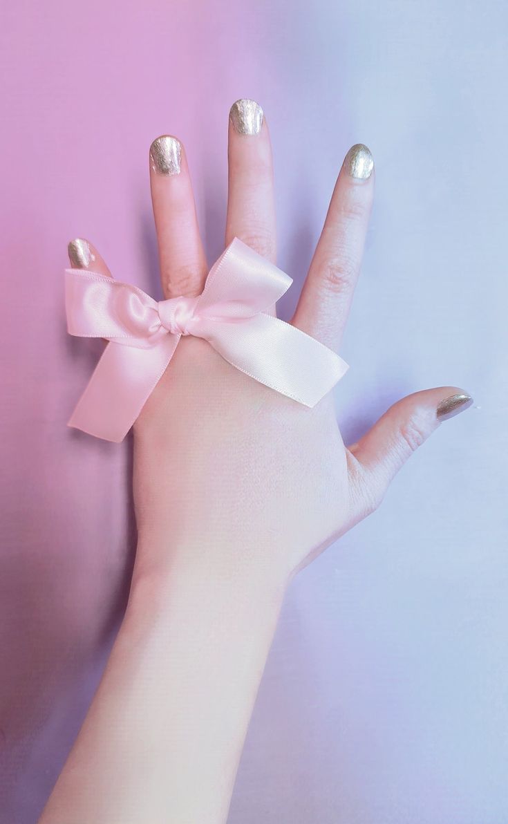 "Feel more feminine when you wear this pink satin ribbon bow around your finger!  Bow is attached to a 2.75\" elastic band." Adjustable Pink Bow For Party, Pink Ribbon Bow For Spring, Pink Satin Wedding Bow, Adjustable Satin Bow For Gifts, Cute Ribbon Bow For Wedding, Pink Bow For Spring Party, Elegant Pink Bow For Gift, Adjustable Pink Bow For Wedding, Adjustable Ribbon Bow Gift