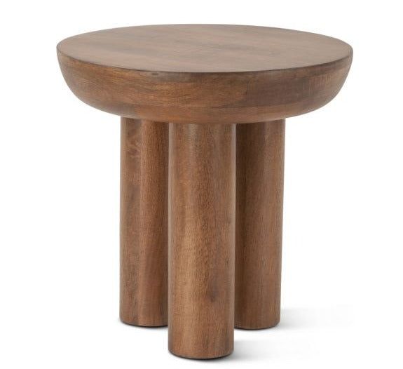 two wooden stools sitting next to each other