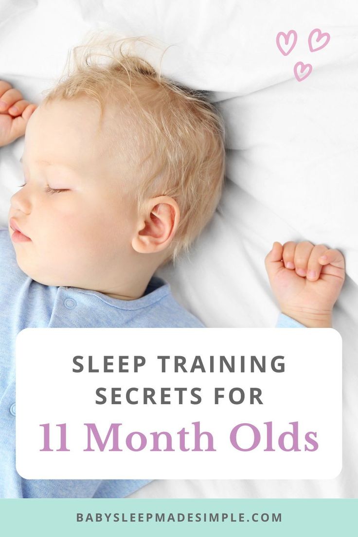 a baby sleeping on top of a bed with the words sleep training secrets for 11 month olds