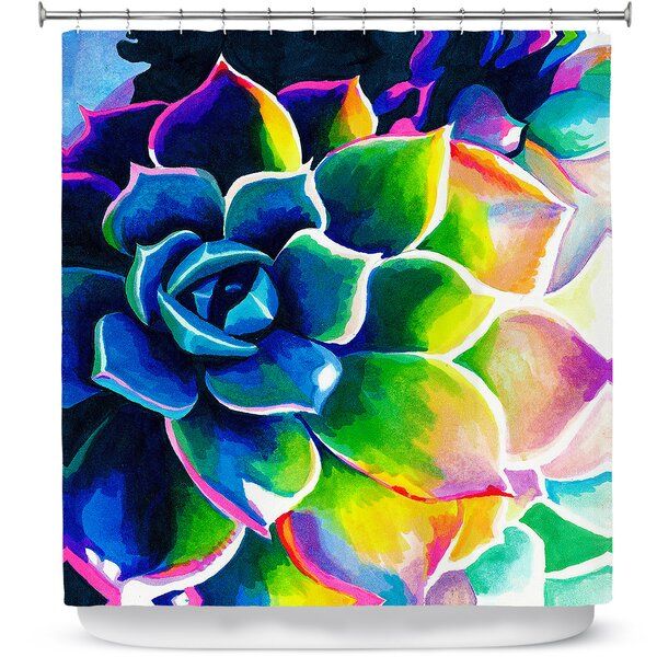 a colorful succulent flower shower curtain featuring an image of a blue, green and yellow