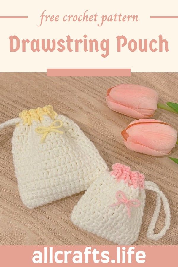 two crocheted drawstring pouches sitting on top of a wooden table