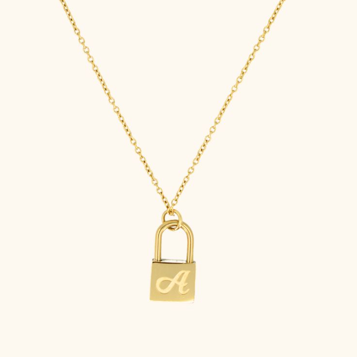 Initial Lock Necklace Initial Pendant Chain Jewelry Gift, Luxury Personalized Formal Necklaces, Formal Engraved Gold-plated Necklaces, Formal Gold Plated Engraved Necklaces, Luxury Pendant Charm Necklace For Everyday, White Gold Chain Necklace For Gift, Formal Gold Plated Engraved Necklace, Elegant Tan Initial Pendant Necklace, Timeless Gold Charm Necklace For Everyday