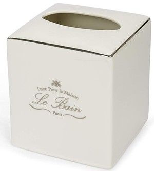 a white tissue dispenser with the words le bain on it's side