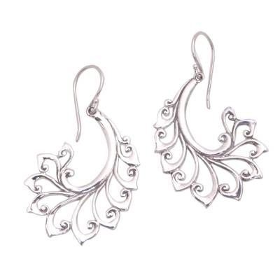 Crafted of sterling silver curling tendrils bloom outward in this stunning pair of dangle earrings from Bali. Made Mustika crafts the earrings accentuating them with a high-polish finish that catches the eye. Sterling Silver Teardrop Jewelry With Artistic Design, Sterling Silver Swirl Jewelry With Matching Earrings, Silver Swirl Sterling Silver Earrings, Unique Silver Swirl Earrings, Sterling Silver Swirl Earrings, Elegant Sterling Silver Jewelry With Artistic Design, Silver Teardrop Earrings With Artistic Design, Silver Swirl Pierced Earrings, Unique Sterling Silver Swirl Earrings