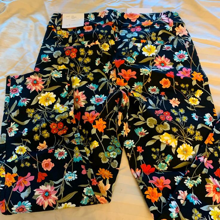 Black And Floral Cropped Pants; Seems To Run On Big Feels More Like A Size 8 Or Size 6 With Room For Stretch High Waist Floral Print Bottoms For Work, High Waist Floral Print Pants For Work, Spring Black Pants With Floral Print, High Waist Floral Print Work Pants, Trendy Stretch Bottoms With Floral Print, Trendy Stretch Floral Print Bottoms, Multicolor Floral Print Pants For Work, Multicolor Floral Print Workwear Pants, Black Bottoms With Floral Print For Spring