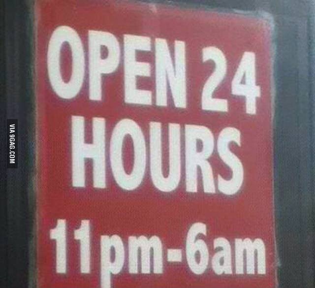 a red sign that says open 24 hours 11pm - 6am