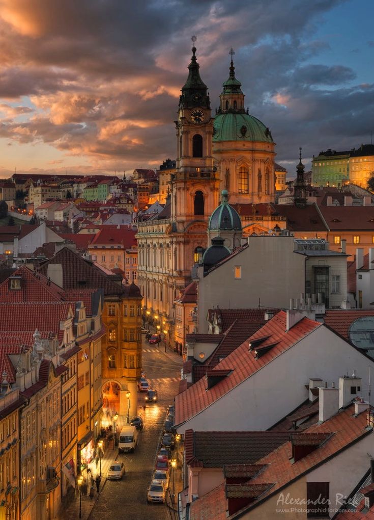 an aerial view of the city at dusk