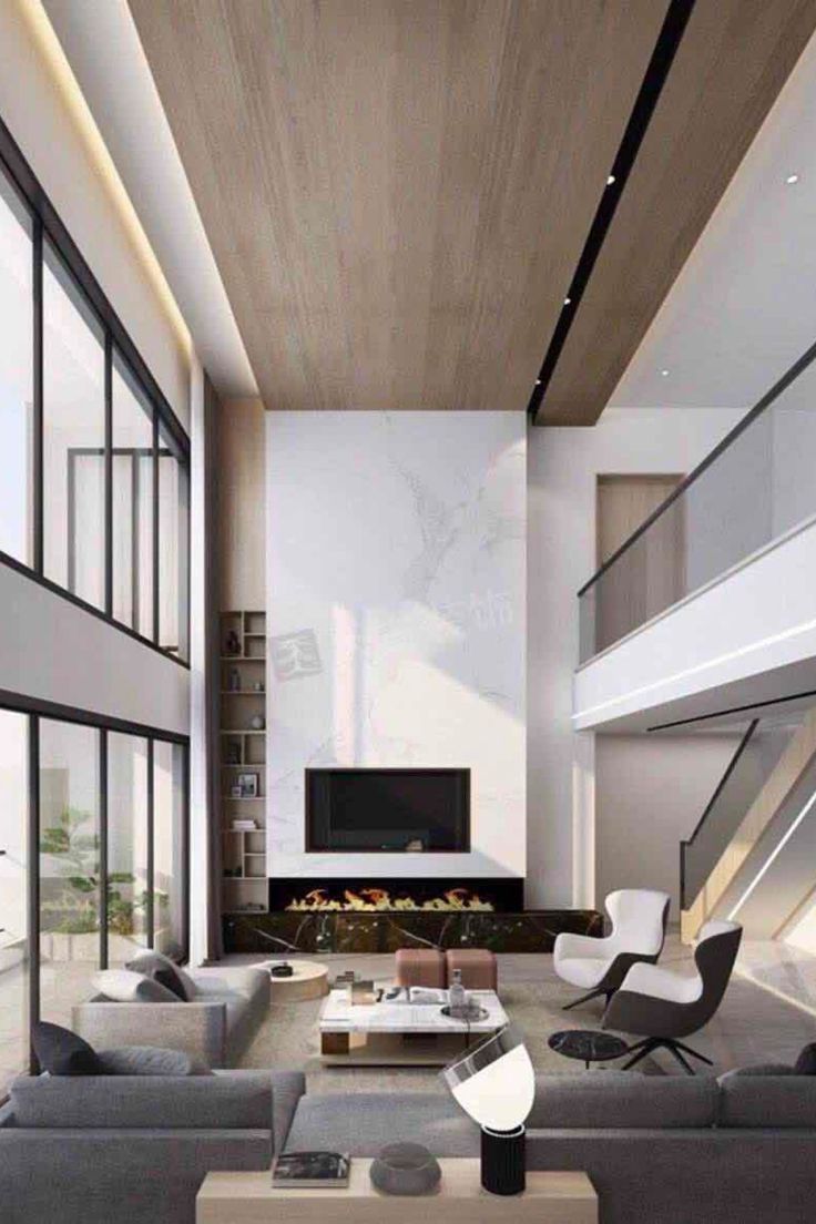 modern living room with high ceilings and large windows