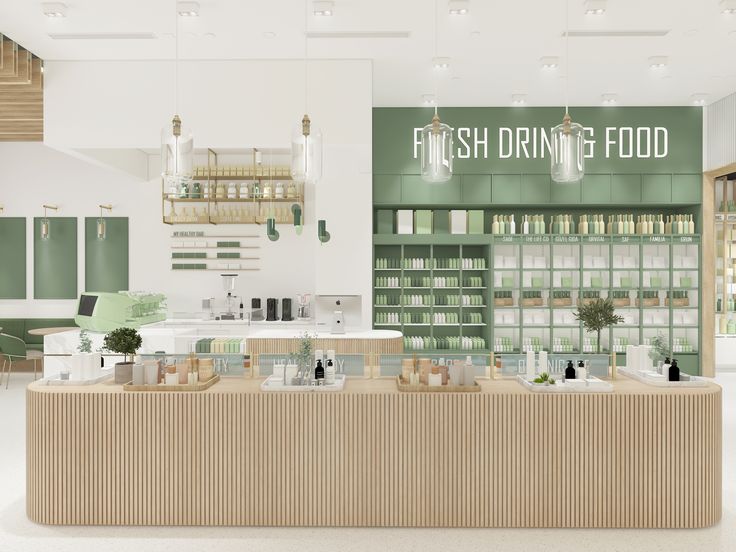 the interior of a store with green and white walls, shelves filled with food items