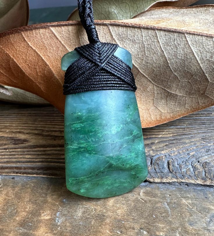 Light Greenish Blue Nephrite Jade Adze Pendant in a satin polish. Each one is uniqueMeasures approximately 2" long on an adjustable nylon cord. Comes with or without our handcrafted wooden gift boxPendant Meaning Adze: Signifies strength, control, determination, and focus Jade Charm, Fun Jewelry, Macrame Knot, Wooden Gift Boxes, Jade Bangle, Nephrite Jade, Jade Earrings, Set Jewelry, Greenish Blue