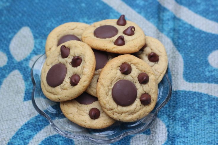 chocolate chip cookies in a glass bowl on a table