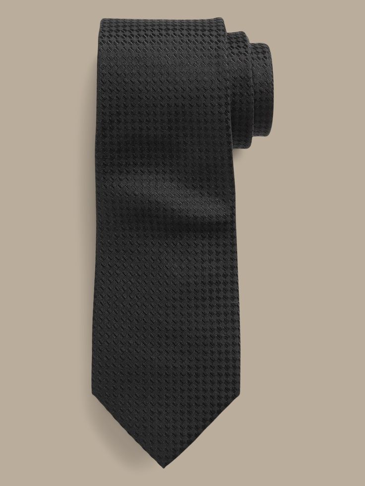 An unequivocally elevated tie, crafted from luxurious, soft silk with a varied texture.  Hand-pressed and shaped for a clean finish.  Measures 3" at widest point.  Length: 58" (147cm) Silk Ties, Banana Republic, Texture, Silk, Black