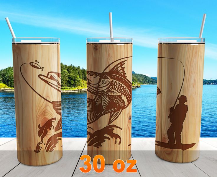 three wooden tumblers with fishing images on them and the words 30oz written in orange