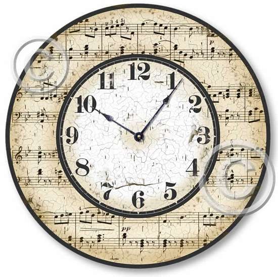 a clock with music notes on it and numbers painted on the front, back and sides