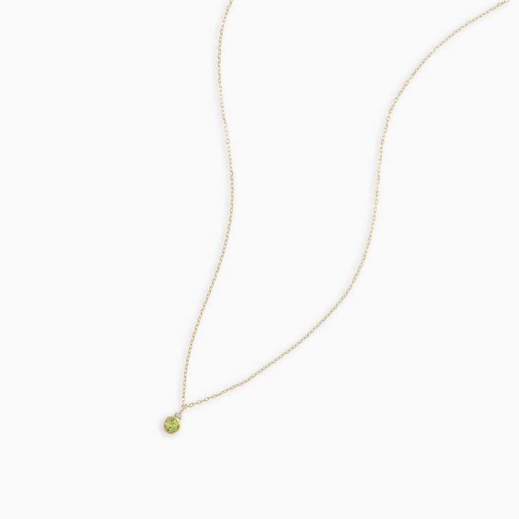 A modern heirloom. Introducing our take on a traditional style. Whether you wear yours or a loved one’s, a birthstone necklace is an easy way to add color and meaning to your look. This birthstone necklace features a 14k gold chain and diamond detail and makes for a perfect, personal gift. Peridot is August's birthstone. Product Details Diamond: 0.01 total carat weight, 1.3 mm GH SI1-SI3 Peridot: 0.15 total carat weight, 3 mm genuine peridot 14k solid gold 16" chain + 2" extender. Adjustable in Delicate Sterling Silver Necklace For May Birthstone, Delicate May Birthstone Gemstone Necklace, 14k Gold Necklace With Gemstone Round Pendant, Sterling Silver Jewelry With Delicate Chain For May Birthstone, Dainty 14k Gold Filled Necklace For May Birthstone, Dainty Round Pendant Necklace For May Birthstone, Delicate Sterling Silver Necklaces With Birthstone, Dainty 14k Gold Filled Necklace With May Birthstone, Everyday Sterling Silver Birthstone Necklace With Delicate Chain