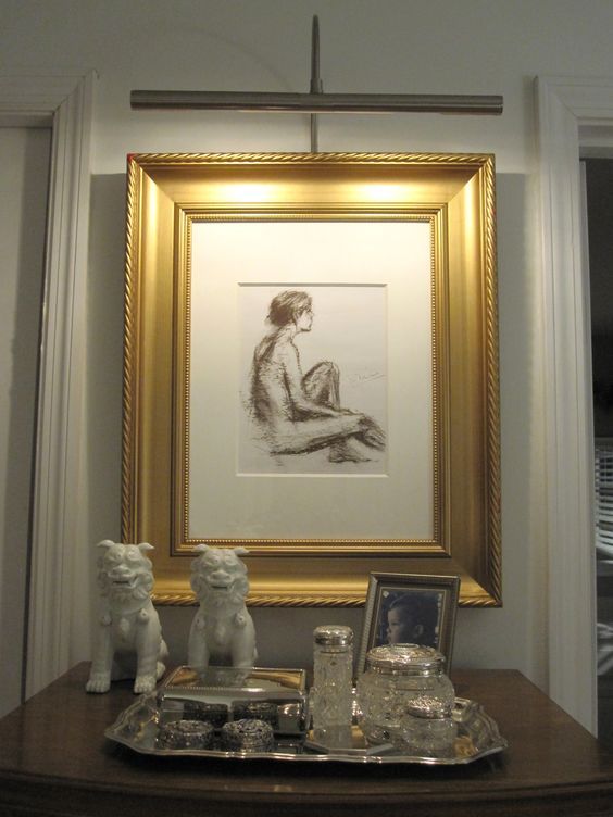 there is a framed drawing on the wall