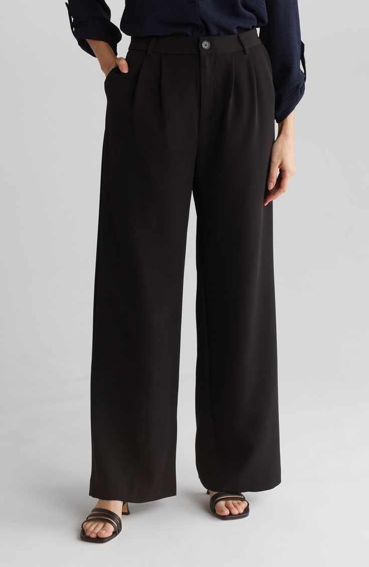 A wide leg furthers the chic appeal of these pants made from stretchy crepe fabric. 30" inseam; 12 1/2" rise (size Small)
 Zip fly with button closure 90% polyester, 10% elastane Machine wash, dry flat Imported Chic Formal Wide Leg Pants With Button Closure, Chic Black Semi-formal Pants, Full Length Culottes For Work, Wide-leg Dress Pants For Office, Versatile Wide Leg Formal Pants, Wide Leg Bottoms With Button Closure For Work, Wide-leg Dress Pants With Button Closure For Office, Loosely Fitted Wide Leg Pants For Work, Formal Wide Leg Versatile Pants