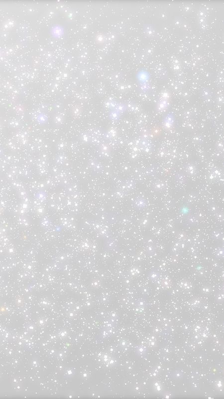 an abstract white background with lots of small stars in the center and light shining down on it