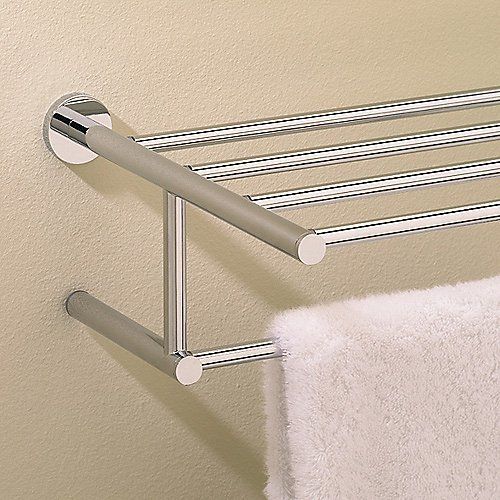 the towel rack is hanging on the wall