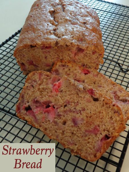 two slices of strawberry bread on a cooling rack with the words, strawberry bread