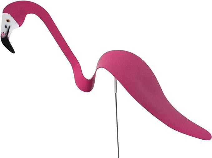 a pink flamingo standing on top of a wooden stick with a white head and long neck