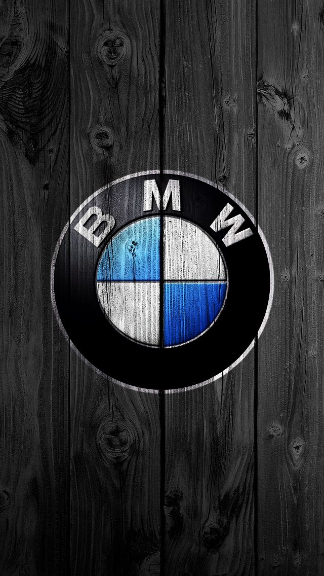 the bmw logo on a wooden wall