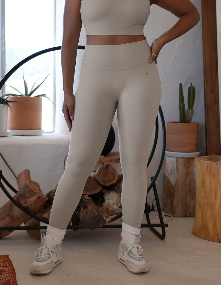 Love Fitness Effortless Leggings Stone High Stretch Beige Yoga Pants For Workout, Beige High Stretch Yoga Pants For Workout, Beige High-stretch Yoga Pants For Workout, Beige Stretch Yoga Pants, Beige Stretch Yoga Pants Athleisure, Beige Stretch Yoga Pants Athleisure Style, Compressive Beige Yoga Leggings, Compressive Beige Leggings For Yoga, Tight Beige Yoga Leggings