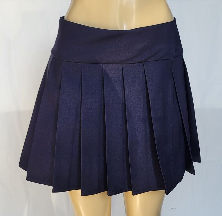 "JUNIOR TO PLUS SIZE \"Navy\" PLAID MINI SKIRT 14\"-16\" LONG. TO ENSURE YOU ORDER THE CORRECT SIZE SKIRT, PLEASE READ THIS CAREFULLY; THEN MATCH IT WITH SIZES. ALL OUR SKIRTS ARE ALWAYS MADE WITH A 3\" LONG WAITSBAND + THE LEGNTH OF THE SKIRT. OUR SKIRTS ARE ALL MADE TO ORDER AND THE LENGTH MAY SLIGHTLY CHANGE A FEW CENTIMETERS, BUT WE TRY TO BE AS ACCURATE AS POSSIBLE.  BELOW IF THE FINAL LENGTH OF THE SKIRT. *XSMALL - Waistband measures 28\" around when fully closed. Skirt is 14\" long from t Navy Skort For School, Fitted Skort For School, Blue Stretch Skort For School, Navy Pleated Skort Casual Style, Navy Pleated Casual Skort, Fitted Preppy Skort For School, Preppy Fitted Skort For School, Navy Casual Pleated Skirt Skort, Casual Navy Pleated Skort