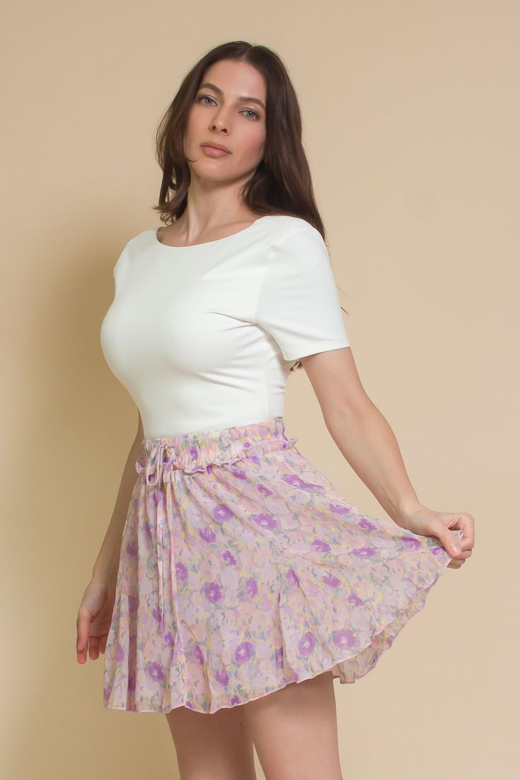 Brand: Lush Ballet style mini skirt with drawstring waist. ♡ Details Color: Lavender Floral Elasticized drawstring waist with ruffle detail Fully lined 100% Polyester Sizing Model Info: Height 5'3"| Bust 32"| Waist 25"| Hips 34" Model is wearing a size small Fit: Standard fit Stretch: Some stretch Skirt has an elasticized waist Measurements: S: Waist 24.5" | Length 16.5" M: Waist 26" | Length 17" L: Waist 28" | Length 17" Spring Mini Skort With Drawstring, Mini Skort With Drawstring For Spring, Spring Drawstring Mini Skort, Spring Drawstring Short Mini Skirt, Spring Mini Skirt With Drawstring, Spring Drawstring Mini Skirt, Feminine Flowy Mini Skirt With Elastic Waistband, Short Drawstring Skirt For Spring, Spring Short Drawstring Skirt