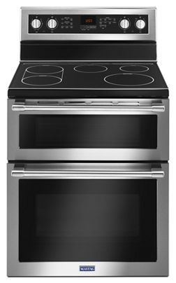 two stainless steel ovens side by side with the same stove top and bottom burner