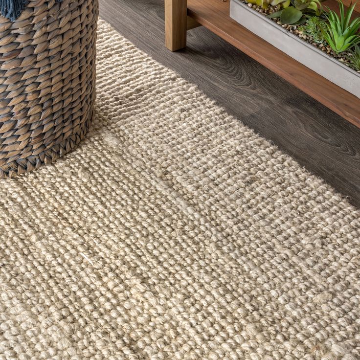 Natural jute fiber and a chunky texture make this handwoven rug a great addition to your home. The solid color works almost anywhere, in both modern or traditional rooms. This rug is reversible for longer wear. JONATHAN Y Natural Fiber Pata Hand 5 X 8 (ft) Woven Jute Light Ivory Indoor Solid Bohemian/Eclectic Area Rug in Yellow | NRF102B-5 Jute Lights, Rustic Area Rugs, Eclectic Area Rug, Bohemian Eclectic, Target Rug, Square Area Rugs, Jute Area Rugs, Light Ivory, Bohemian Area Rugs