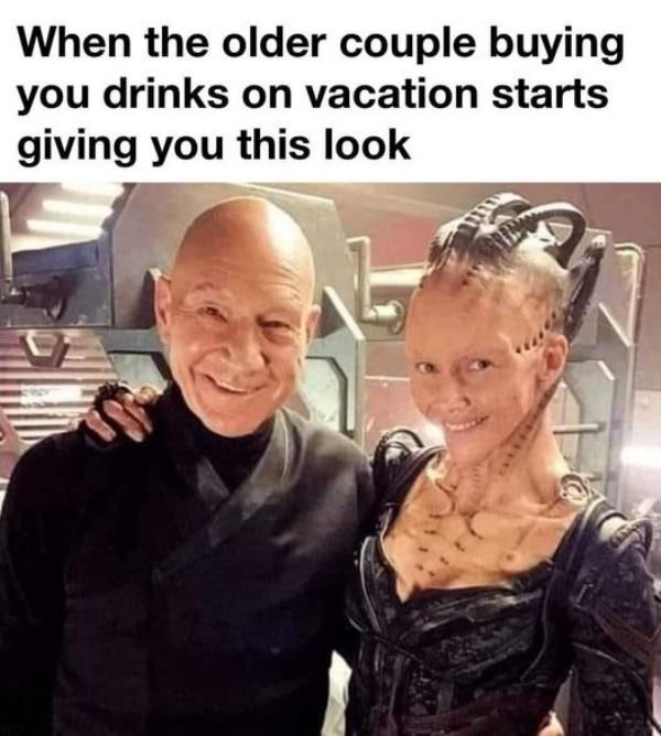 a man and woman posing for a photo with the caption, when he older couple buying you drinks on vacation starts giving you this look picard