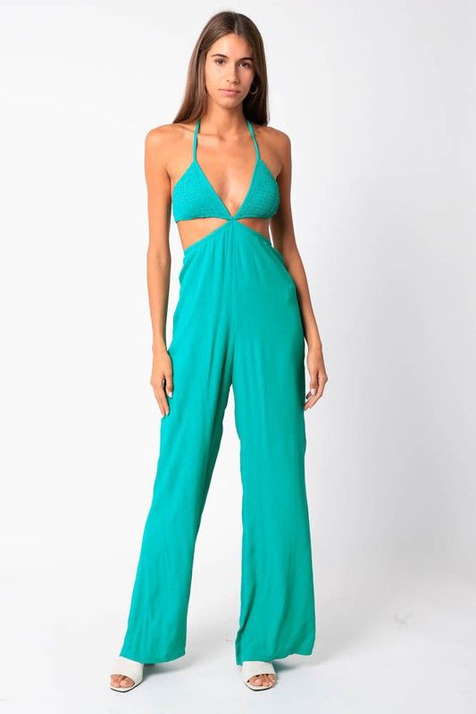 The cutest summer jumpsuit! Featuring a smocking bust, and cut outs. Fits true to size! Sami is 5'9" and wearing a medium. Spring Halter Neck Jumpsuit Or Romper, Spring Halter Neck Jumpsuit, Spring Strapless Halter Neck Jumpsuit, Trendy Strapless Jumpsuit For Summer, Blue Jumpsuits And Rompers With Smocked Back For Beach, Summer Beach Jumpsuit With Smocked Back, Summer Jumpsuits And Rompers With Smocked Back, Casual Strapless Jumpsuit For Beach With Smocked Back, Backless Stretch Jumpsuits And Rompers For Spring