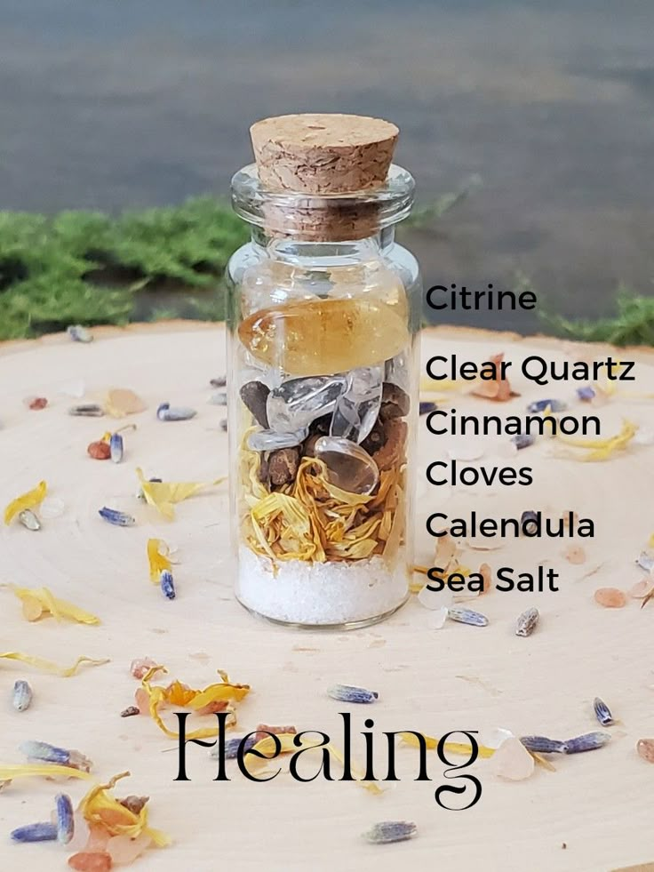 Healing spell jar photo with labels of what is inside- Citrine, clear quartz, Cinnamon, cloves, calendula, sea salt Healing Jar Witchcraft, Serenity Spell Jar, Solar Eclipse Spell Jar, Beginner Witch Spell Jars, Healing Spells For Others Health Jar, Herbal Spell Jars, Spell Jars Witchcraft Aesthetic, Witch Bottle Spells, Mini Spell Jar Necklace