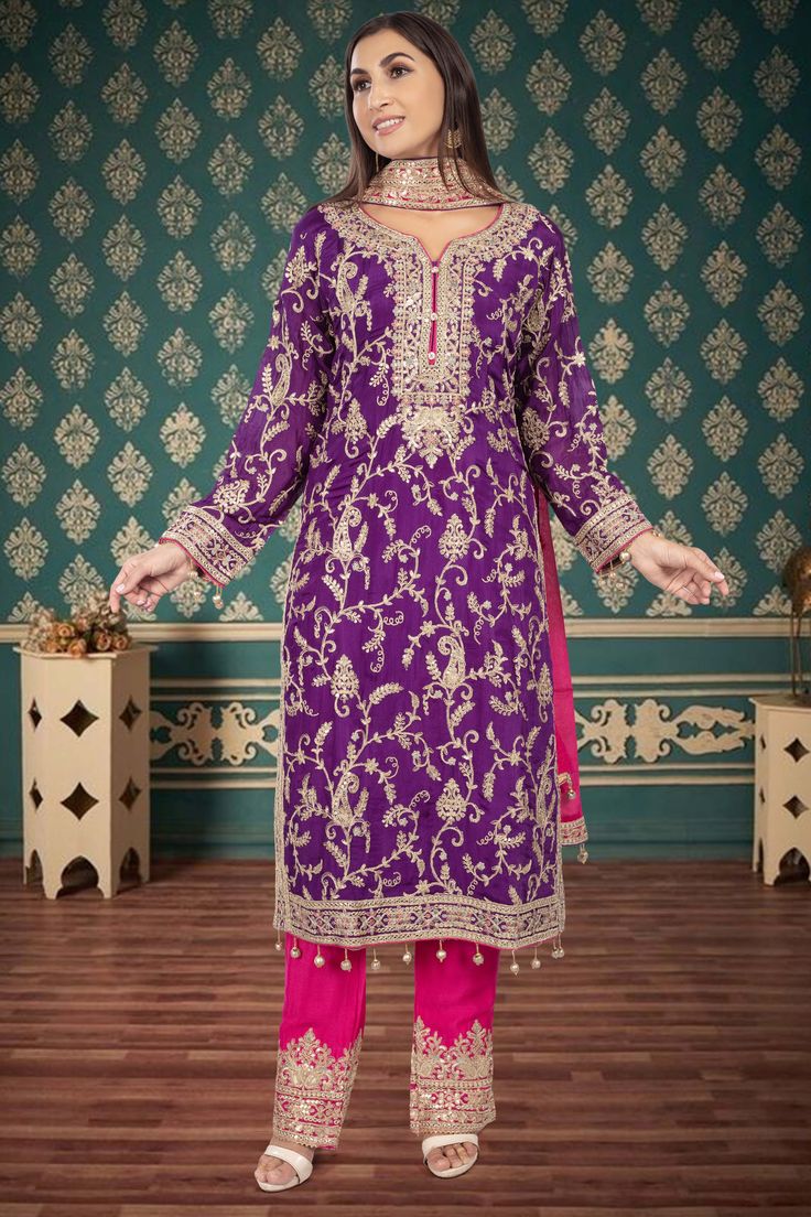 Elevate your evening attire with our Partywear Suit D-234. Featuring exquisite sequin and thread embroidery, this suit exudes sophistication and luxury. Command the attention of the room and make a statement with this exclusive piece. Festive Formal Embroidered Fabric With Sequins, Festive Formal Embroidered Sequin Fabric, Elegant Semi-stitched Purple Sets, Elegant Purple Salwar Kameez With Zari Work, Elegant Purple Salwar Kameez For Eid, Elegant Purple Unstitched Suit With Zari Work, Embellished Long Sleeve Unstitched Party Suit, Elegant Purple Sets With Resham Embroidery, Elegant Semi-stitched Purple Embroidered Fabric