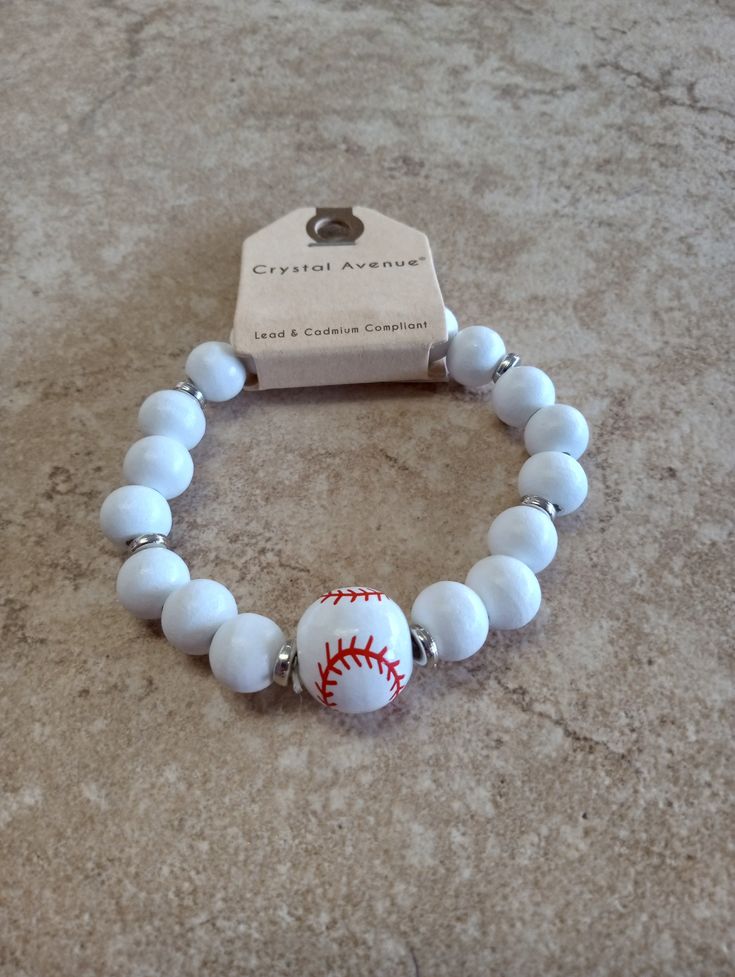 Beaded Baseball Bracelets Team Spirit Beaded Bracelets For Game Day, Game Day Team Spirit Stretch Bracelet With Round Beads, Game Day Bracelets With Letter And Round Beads, Team Spirit Round Beads Jewelry For Game Day, Sporty Beaded Bracelets For Sports Events, Casual White Bracelets For Team Events, Sporty Bracelets With Round Beads For Sports Events, White Beaded Bracelets For Sports Events, White Team Spirit Bracelets For Game Day