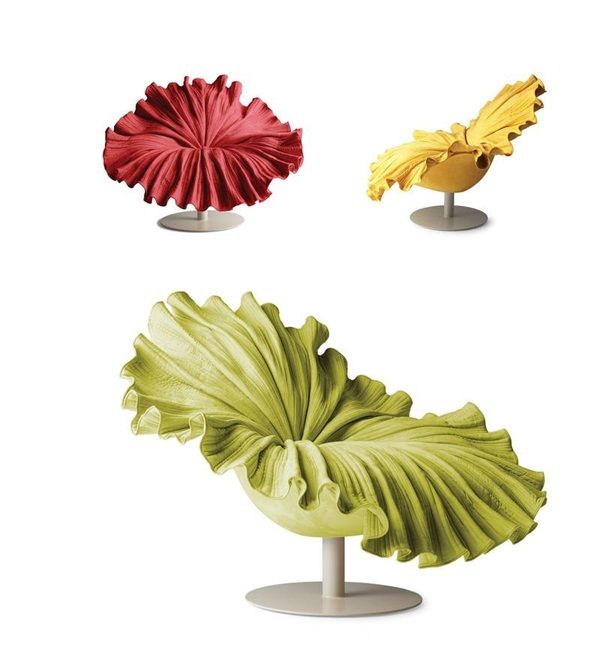 three different types of leaf shaped objects on display in front of a white background, including one red and one yellow