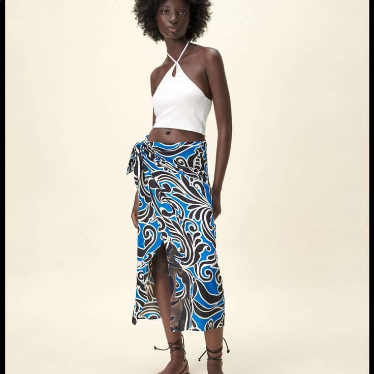 Printed Wrap Skirt Chic Long Wrap Skirt For Beach, Chic Long Wrap Skirt For The Beach, Versatile Maxi Skirt For Vacation, Chic Long Skirt For Beach Season, Chic Beach Wrap Skirt With Lining, Zara Flowy Maxi Skirt For Vacation, Chic Relaxed Wrap Skirt For Vacation, Chic Lined Beach Skirt, Chic Lined Wrap Skirt For Beach