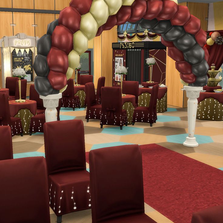 a large room filled with lots of red and white balloons hanging from the ceiling over chairs